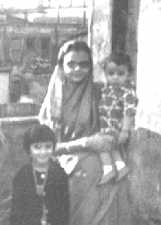 Subrata on mother's lap and sister at the age of 2 years